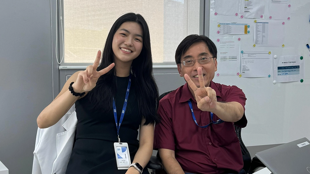 Wen Hui with her supervisor, Mr. Tan Yeow Kiat