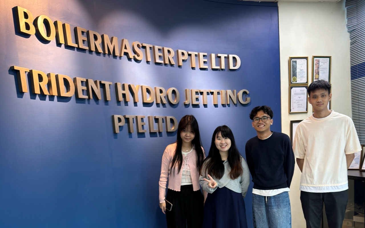 Jaka (second from right) and colleagues at Trident Hydro Jetting